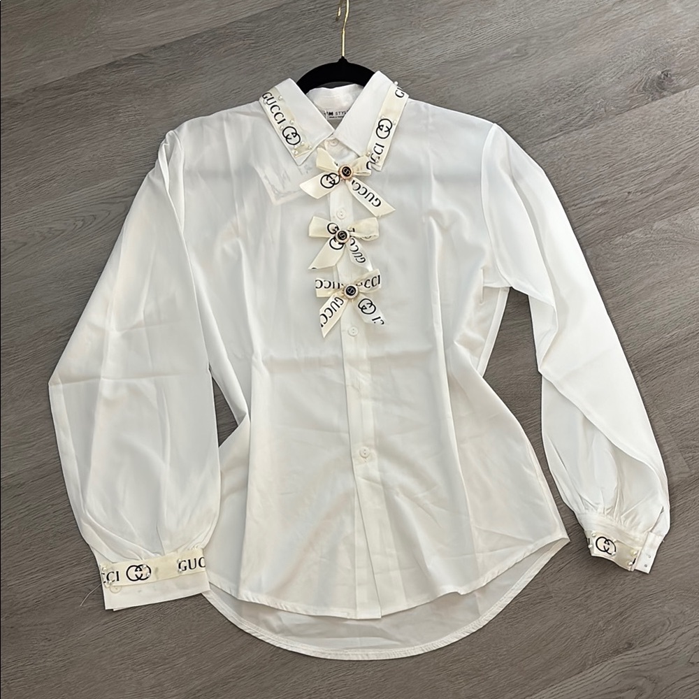 White Blouse with Logo Accents